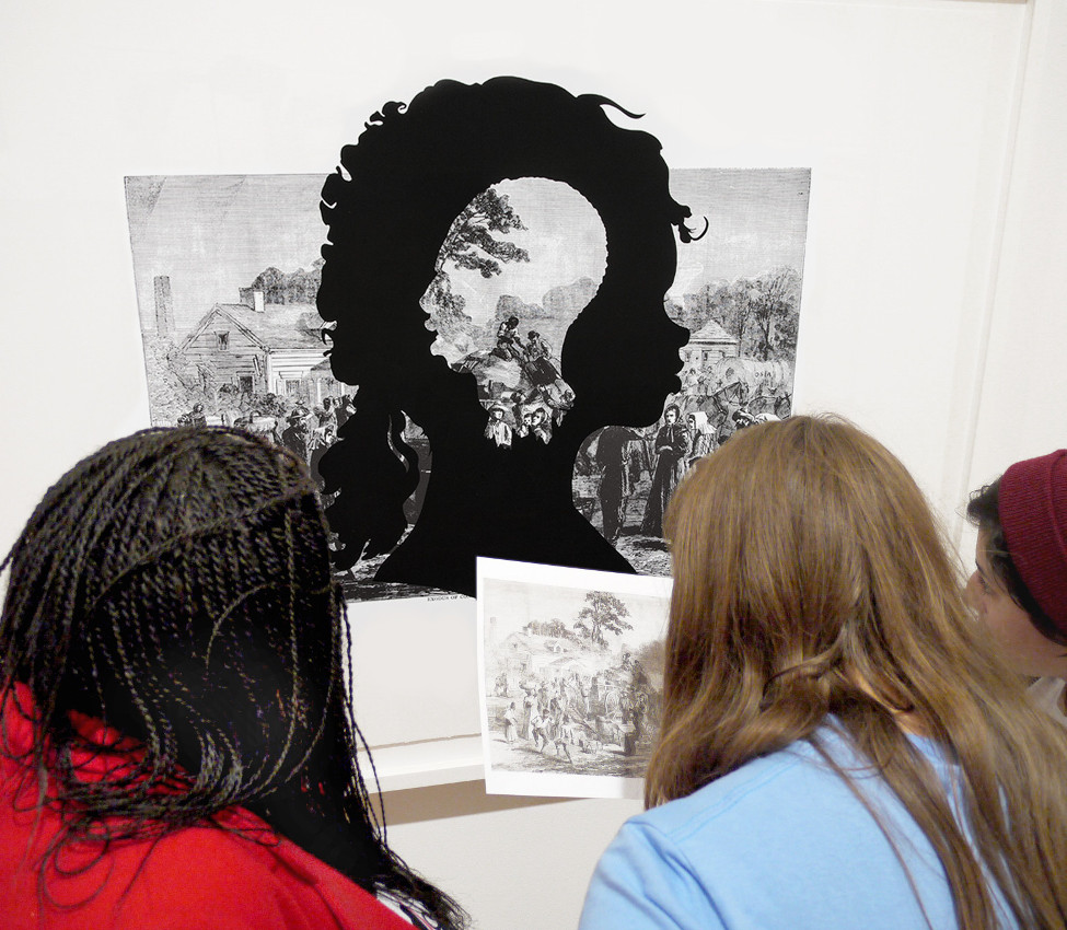 Mary Renda's class discusses a Kara Walker print, fall 2012