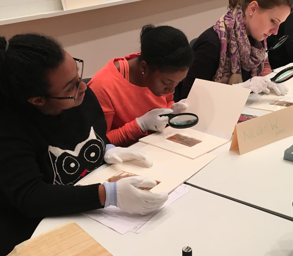 Students examine early coinage and manuscripts