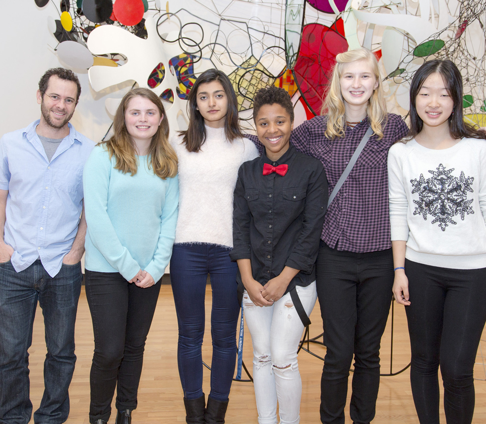 Assistant Professor of Mathematics Dylan Shepardson and students in his "Entropy" seminar