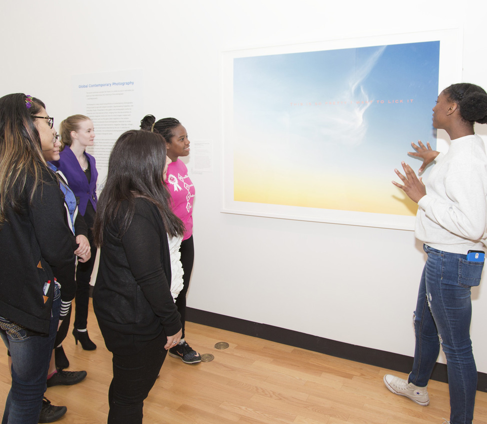 Students lean in for a closer look