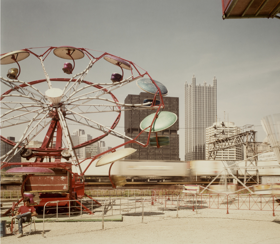 Joel Meyerowitz (American, b. 1946), Pittsburgh, Carnival and train (detail), 1984