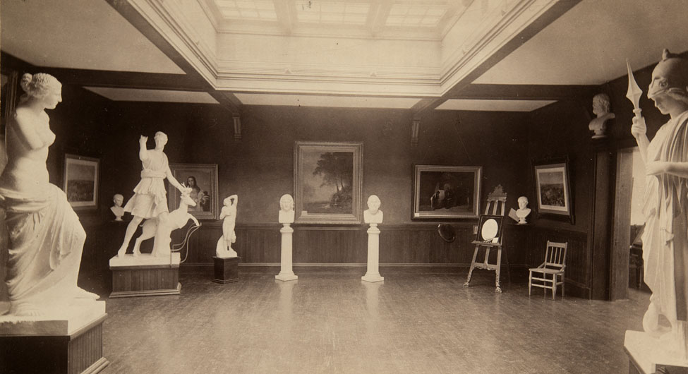 Upper gallery at Dwight Hall; Albert Bierstadt's Hetch Hetchy Canyon displayed on back wall