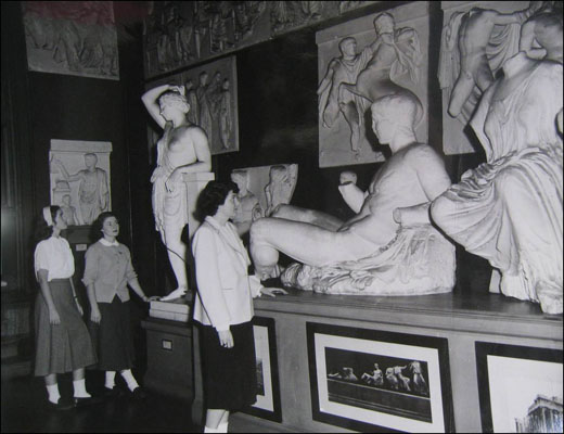 Students examine plaster casts