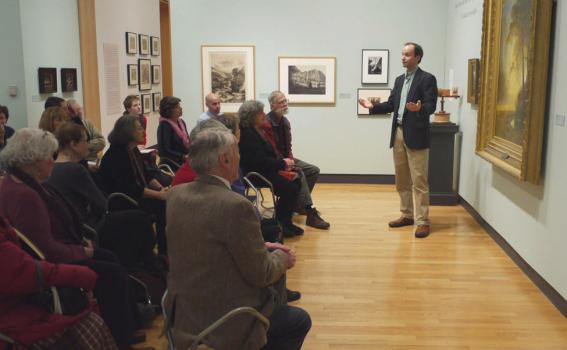 Leslie and Sarah Miller Director of the Miller Worley Center for the Environment Tim Farnham addresses the audience during a gallery talk