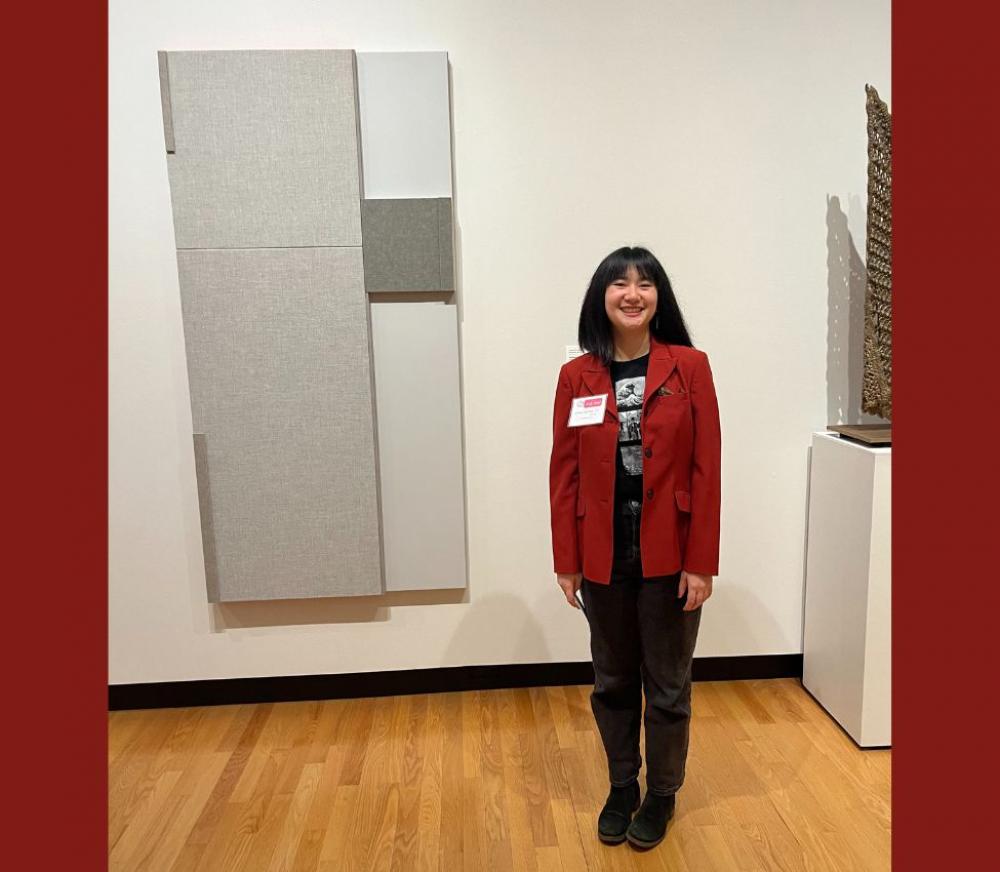Photo of Emma Harrison ’26 in front of Untitled (Open Measure) by Jennie C. Jones Photo of Emma Harrison ’26 in front of Untitled (Open Measure) by Jennie C. Jones