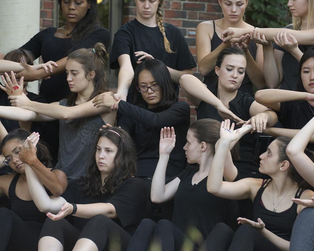 Student dancers perform outside the Museum