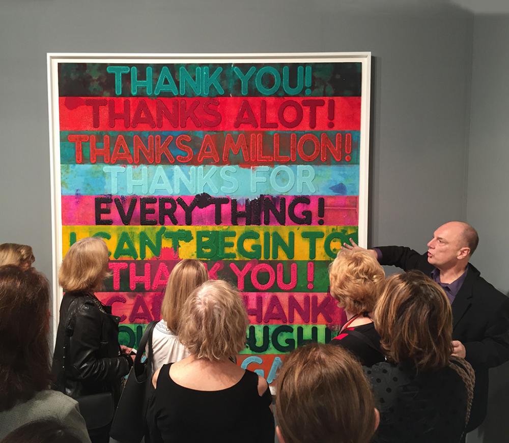 John Stomberg discusses a monoprint by Mel Bochner at the Quint Contemporary booth at Art Basel Miami Beach