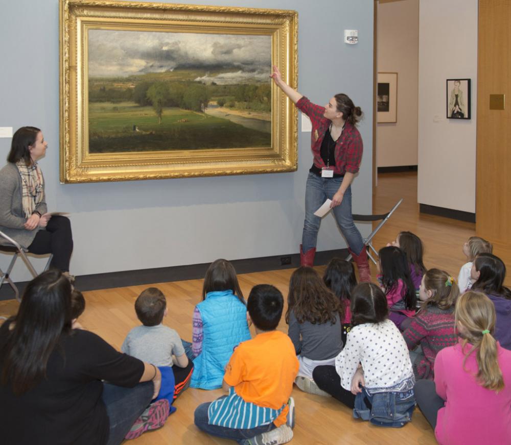 Children explore a George Inness painting with MHCAM Student Guides