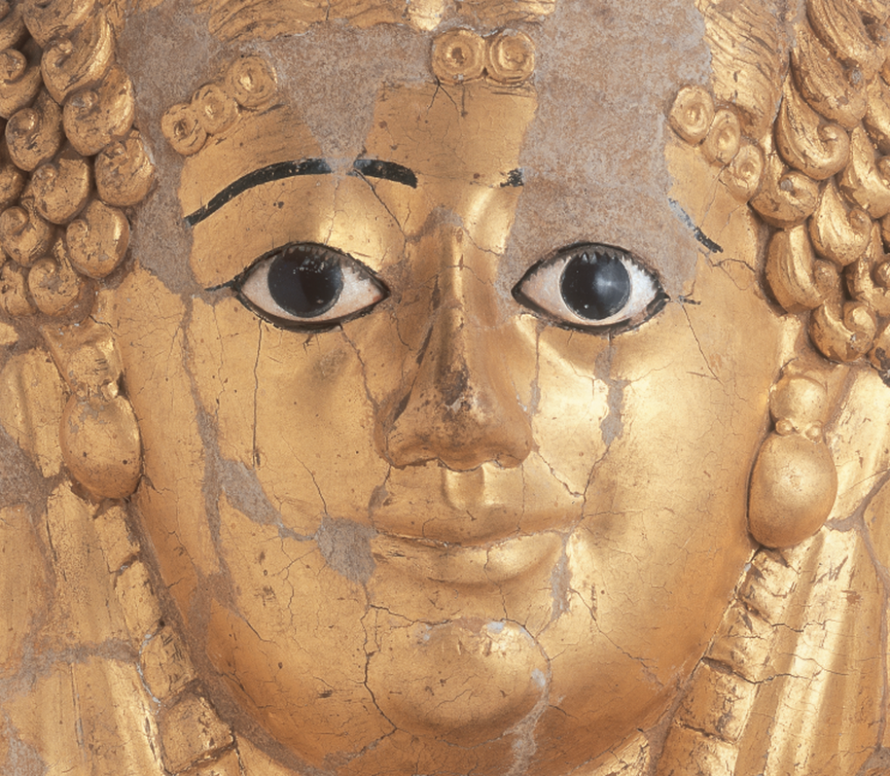 Early Roman Period, Hawara, Mummy mask (detail), cartonnage, gilt, bronze, and glass, 40–60 CE 