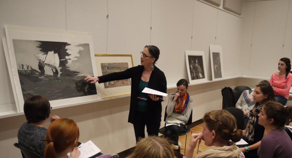 Film Studies Professor Amy Rodgers guides her students through a visual examination of a work of art Film Studies Professor Amy Rodgers guides her students through a visual examination of a work of art