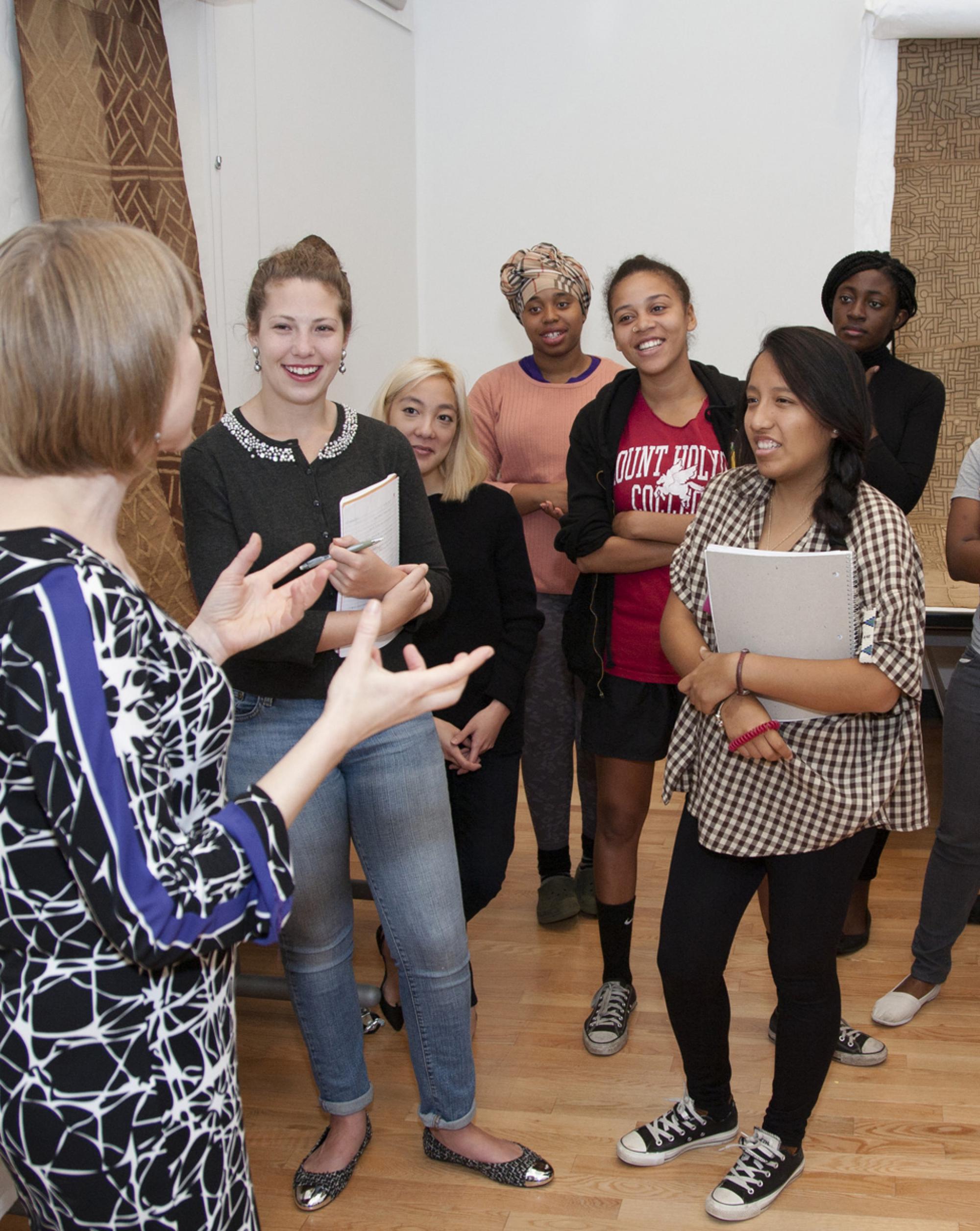 Professor Amanda Gilvin and Art History students examine African Art Professor Amanda Gilvin and Art History students examine African Art