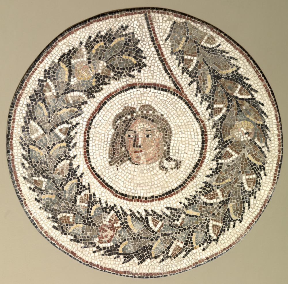 Roman, Floor mosaic with a head encircled by a garland Roman, Floor mosaic with a head encircled by a garland