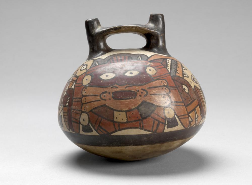 Nasca, Double-spout and bridge vessel with anthropomorphic being Nasca, Double-spout and bridge vessel with anthropomorphic being