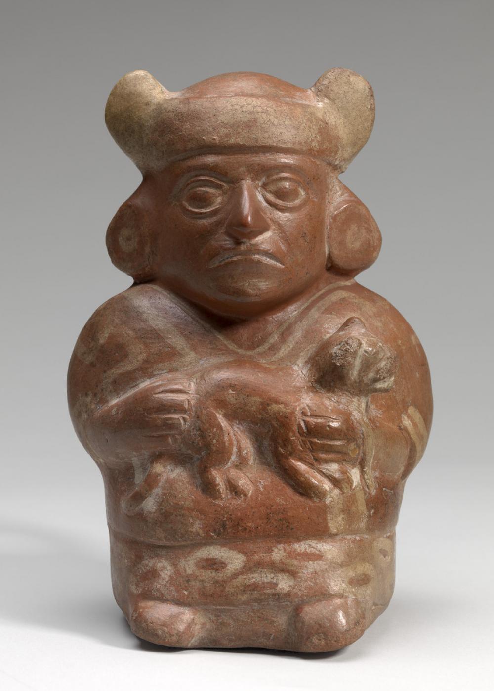 Moche, Stirrup-spouted vessel in form of a figure holding a feline
