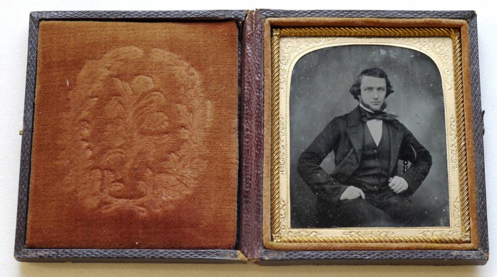 American, [portrait of seated man]