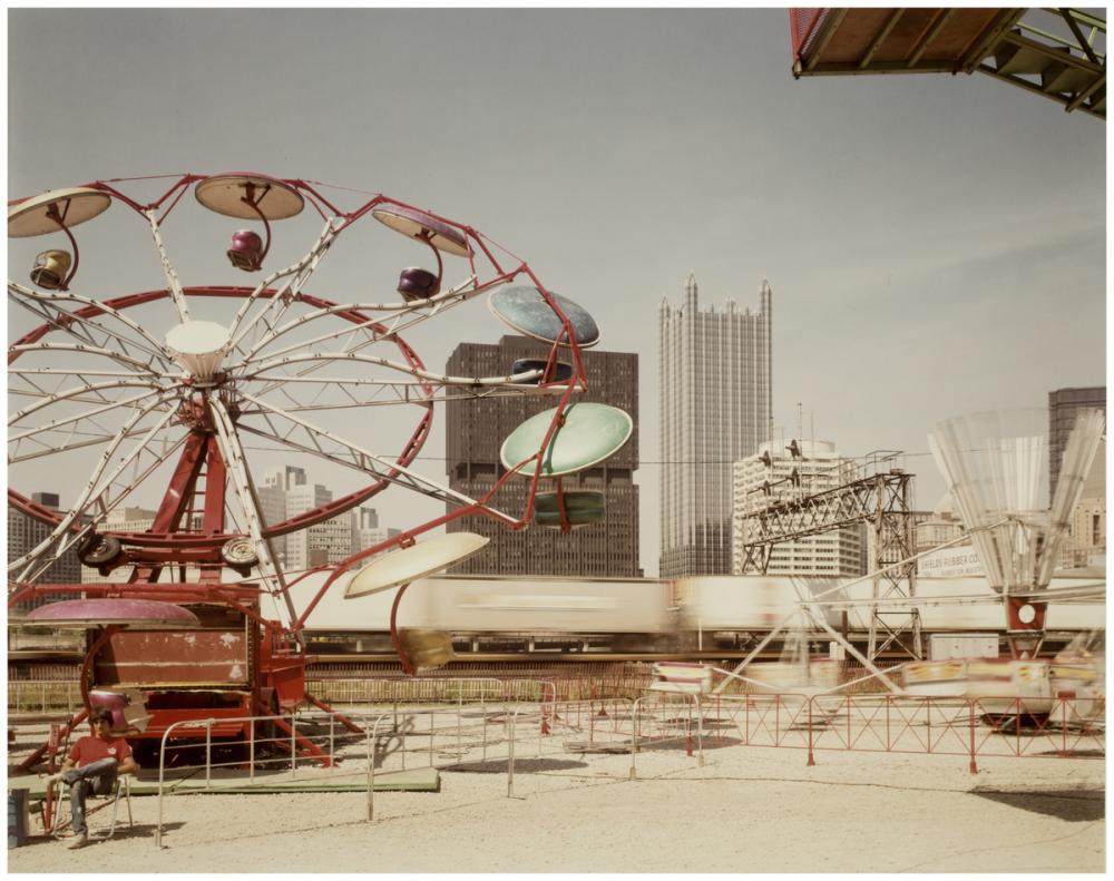 Joel Meyerowitz (American, b. 1946), Pittsburgh, Carnival and train, 1984 Joel Meyerowitz (American, b. 1946), Pittsburgh, Carnival and train, 1984