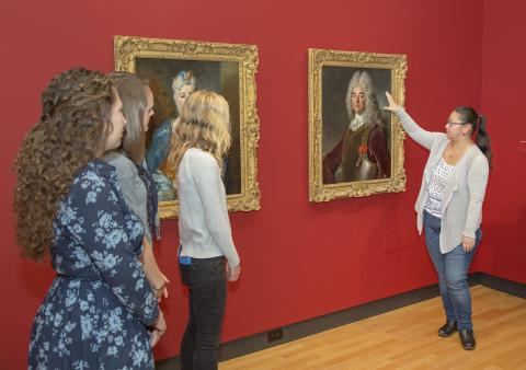 Clara Gorman '18 workshops her Sightlines tour, "Picturing Gender", while other student guides observe.