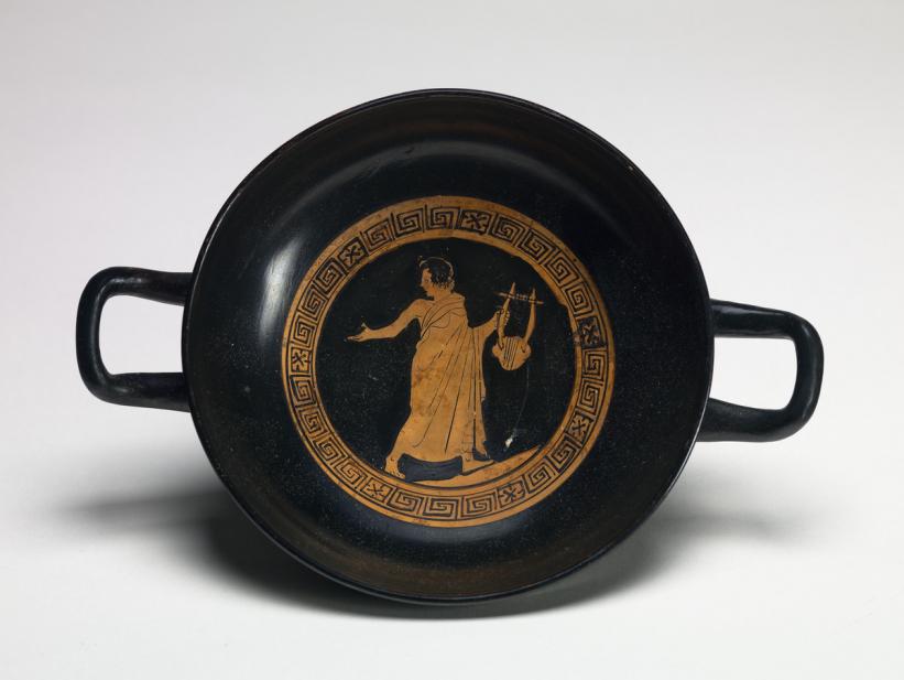 Greek, kylix showing a youth with lyre