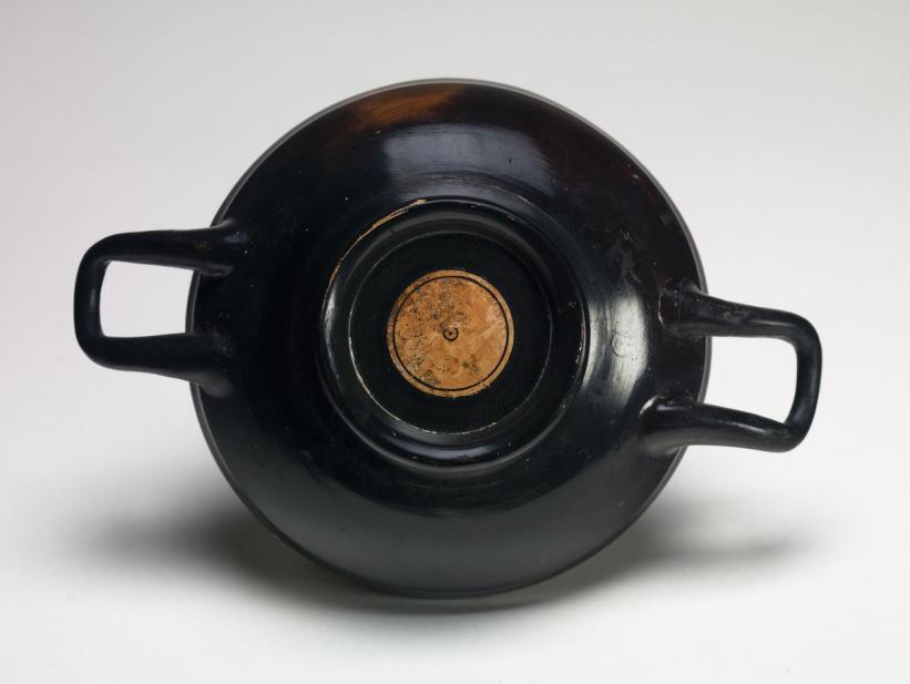 Greek, kylix showing a youth with lyre