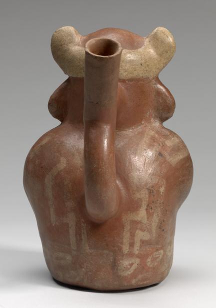 Moche, Stirrup-spouted vessel in form of a figure holding a feline