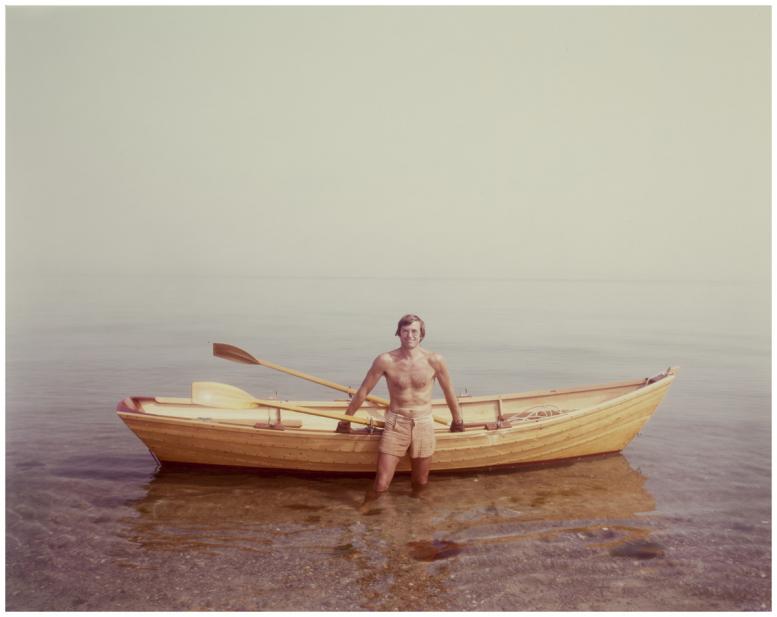 Joel Meyerowitz (American, b. 1946), Paul Theroux and his boat, 1983