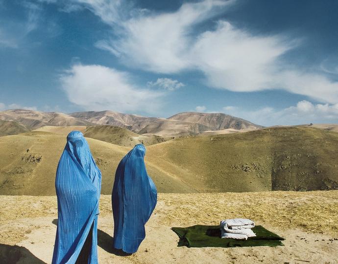 Lynsey Addario (American, b. 1973), Two Burqas: November 14, 2009. Nazer Begam and her pregnant daughter, Noor Nisa, 20, wait for transport to hospital after their car broke down in Badakshan, Afghanistan (#1 from the series Veiled Rebellion), 2009/2015