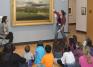 Children explore a George Inness painting with MHCAM Student Guides