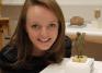 Taylor Anderson '15 with the Roman Lar she researched