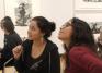 Students in the special exhibition gallery discuss Kara Walker prints
