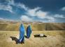 Lynsey Addario (American, b. 1973), Two Burqas: November 14, 2009. Nazer Begam and her pregnant daughter, Noor Nisa, 20, wait for transport to hospital after their car broke down in Badakshan, Afghanistan (#1 from the series Veiled Rebellion), 2009/2015