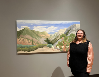 Photo of Hilary Vergera ’24 in front of Sierra Ravine by Kay WalkingStick