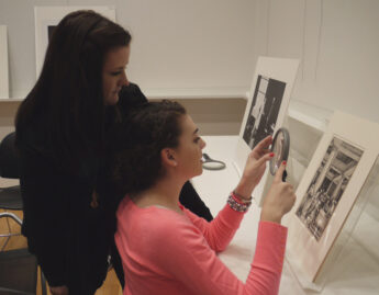 Film Studies students work collaboratively to compare and contrast images according to formal artistic elements, Film Studies students discuss the formal elements of artwork in preparation for analyzing film via its structural and visual components, Film Studies Professor Amy Rodgers guides her students through a visual examination of a work of art