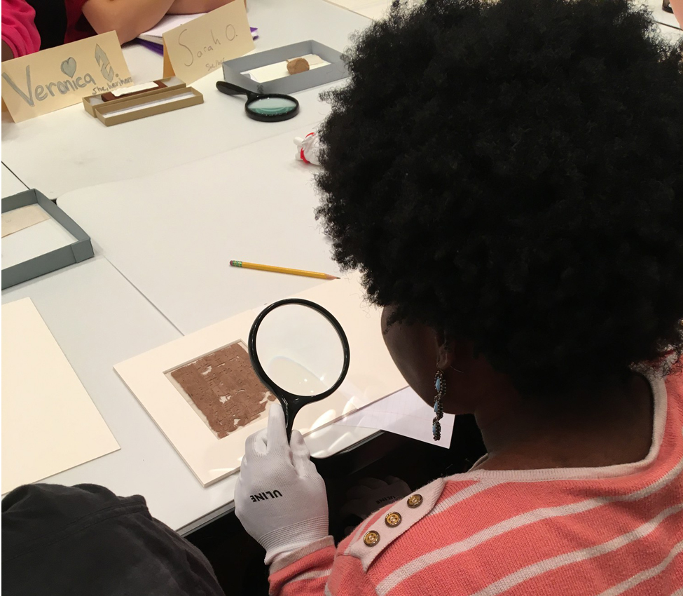 Students examine early coinage and manuscripts, Students examine early coinage and manuscripts