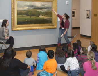 Children explore a George Inness painting with MHCAM Student Guides
