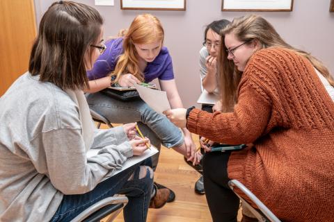 Students collaborating on label texts, Oct 1 2018