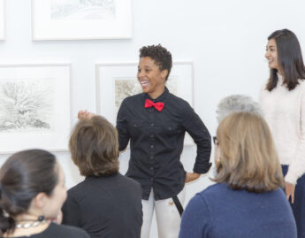 First-Year Seminar students discuss their observations of a Judy Pfaff sculpture, Assistant Professor of Mathematics Dylan Shepardson and students in his 