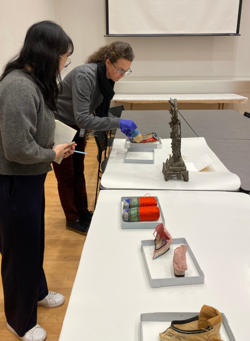 Keyang Zhao and Abigail Hoover with shoes