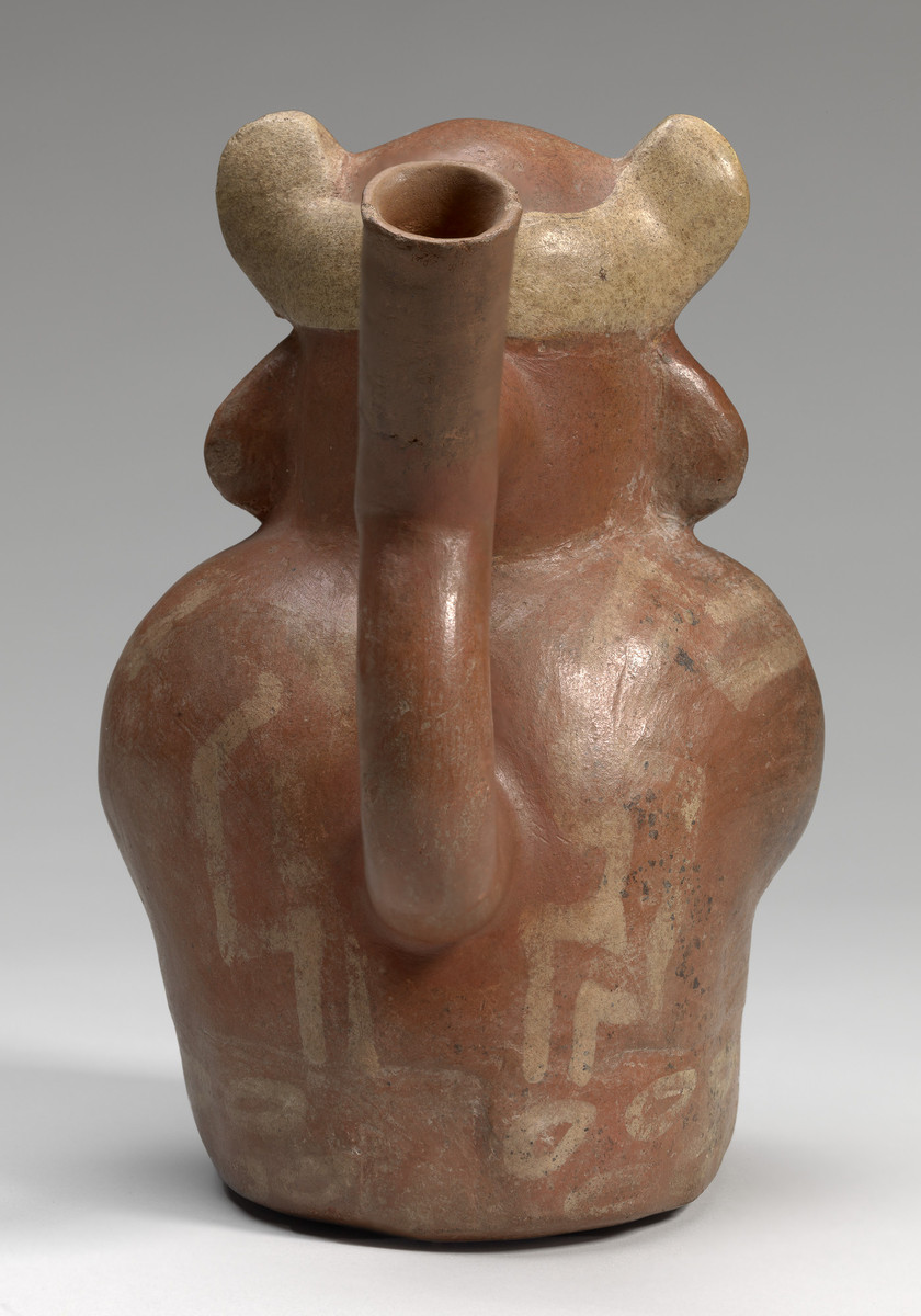 Moche, Stirrup-spouted vessel in form of a figure holding a feline