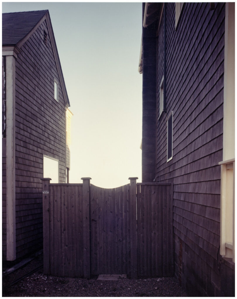 Joel Meyerowitz (American, b. 1946), Right of Way, fence, gold light, 1989