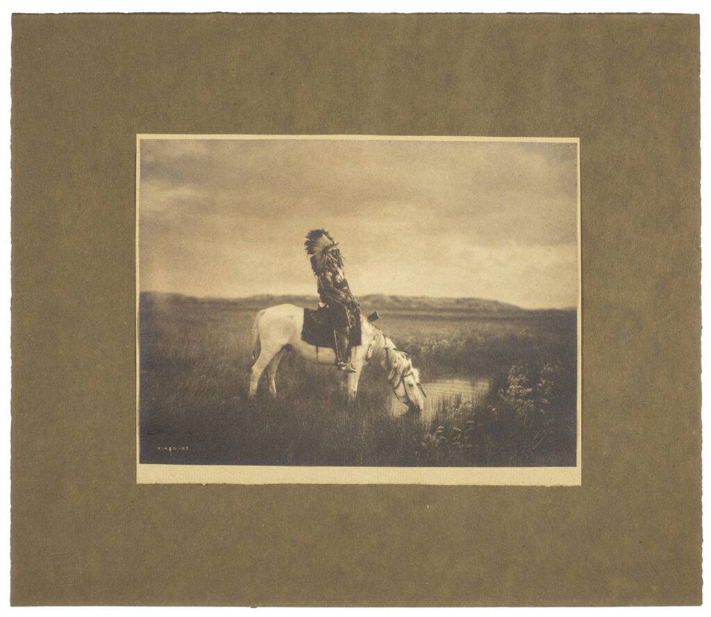 Edward Sheriff Curtis (American, 1868-1952), Sioux sub chief Red Hawk - Oasis in the Badlands, South Dakota, 1904