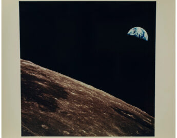 National Aeronautics and Space Administration (American), [Image of the earth taken from the moon with section of the moon and earth visible], 1969 July
