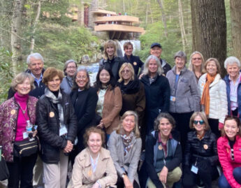 Director Tricia Y. Paik (at right) with Director's Circle members on annual art tour, at Frank Lloyd Wright’s Fallingwater, PA