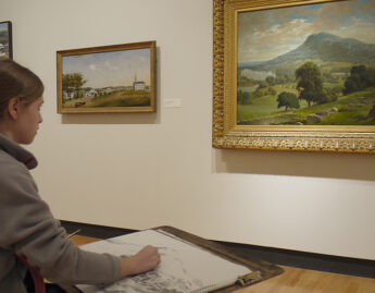 Student sketching in the galleries