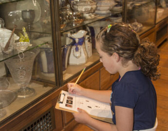 Elementary school student visiting the Joseph Allen Skinner Museum