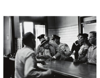 Charles Moore (American, 1931-2010), 	Dr. Martin Luther King, Jr. is arrested for loitering outside a courtroom where his friend and associate Ralph Abernathy is appearing for a trial, from Pictures That Made a Difference: The Civil Rights Movement, 1958