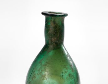 Small green glass flask
